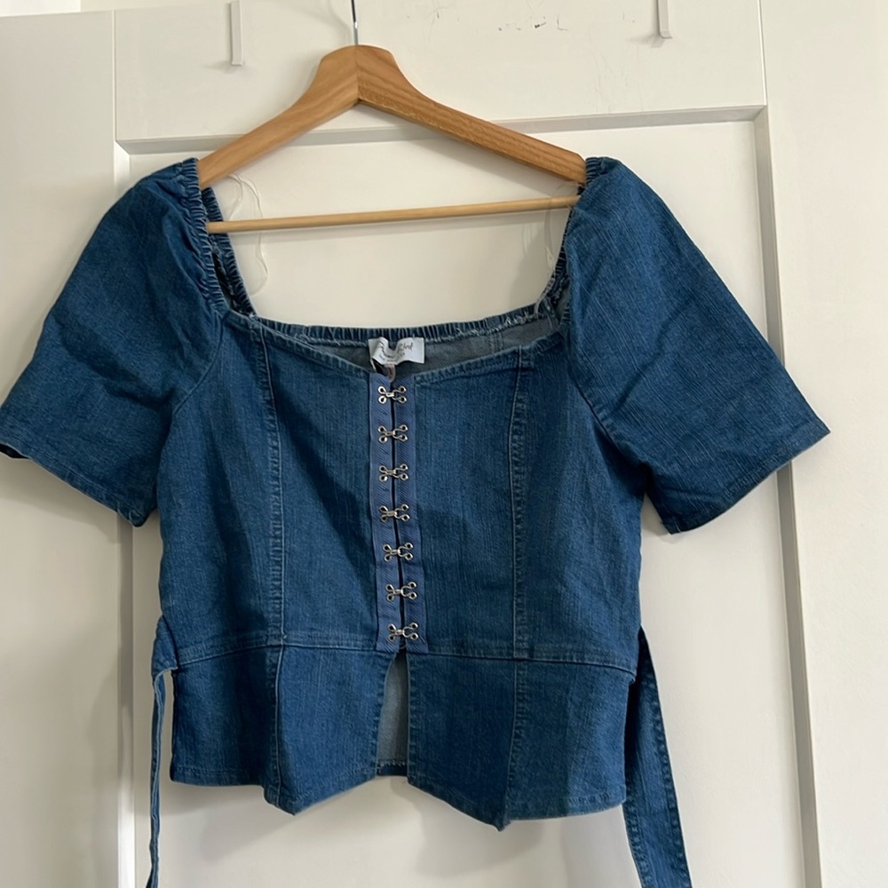 Clasp front denim peplum top